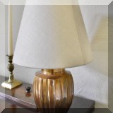D05. Gold toned table lamp. 